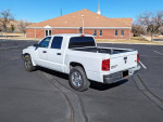 2005 Dodge Dakota SLT Quad Cab V8 parked with bed liner, in great condition and ready for work.