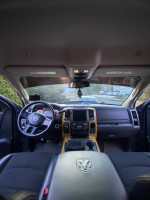 Interior view of a 2018 Ram 2500 Mega Cab with a clean dashboard and stylish seating.