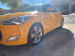 Yellow 2012 Hyundai Veloster with backup camera, excellent interior and new parts for sale.